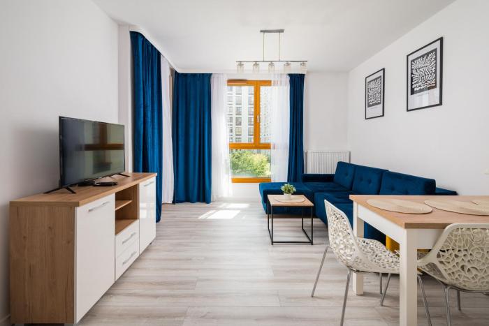 Wola Pleasant Apartment by BookingHost