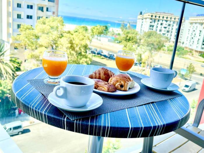 Modern elegance with Sea Views in Central Tangier - Steps to Beach, train and attractions!