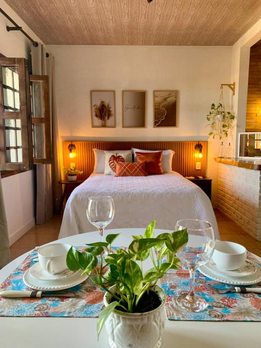 Suíte frente mar com cozinha e quintal pés na areia