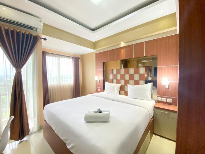 Cozy Studio Room at Oasis Cikarang Apartment By Travelio