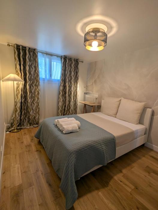 Cosy appartment with access to garden, parking and direct line to Eiffel tower