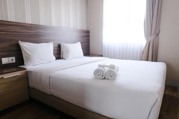 Homey and Cozy 2BR at Mekarwangi Square Cibaduyut Apartment By Travelio