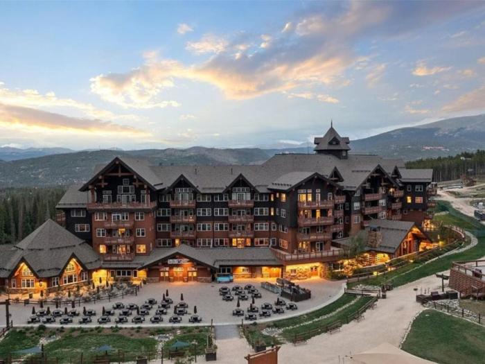 Expansive 4 Bedroom Ski In, Ski Out One Ski Hill Residence Located At The Base Of Peak 8 With Beautiful Views