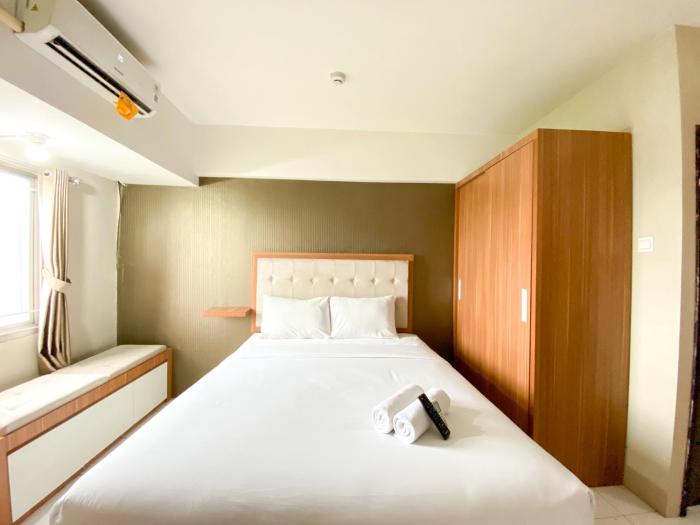 Full Furnished with Simply Look Studio Room Mont Blanc Bekasi Apartment By Travelio