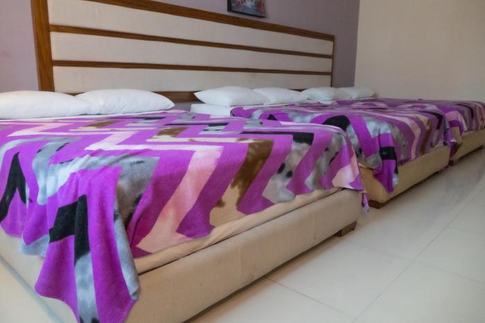 Infinity Suites Habitación Triple 203