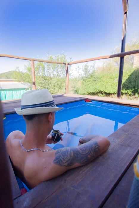 Cabaña serrana con pileta privada y vistas a las sierras, Unquillo