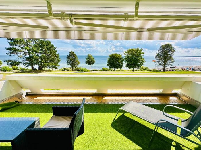 FeWo Traumblick - Küstenklang erste Reihe mit TRAUM Meerblick aus dem Bett