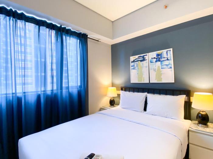 Cozy Designed 2BR with Working Room at Meikarta Apartment By Travelio