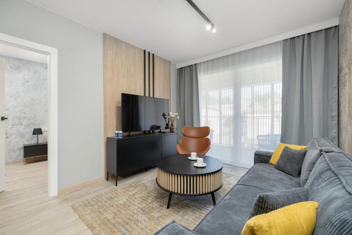 Nowoczesny i Elegancki Apartament A212 z Balkonem i Parkingiem by Noclegi Renters