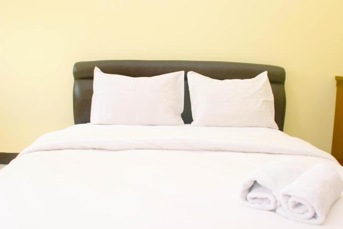 Warm and Homey Studio Room at Maple Park Sunter Apartment By Travelio