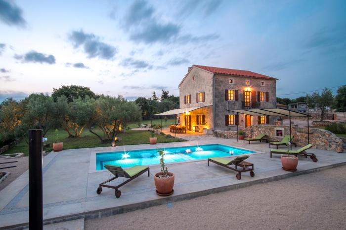 Villa with pool, olive garden and sea view by TRAVELER tourist agency Krk - ID 2147