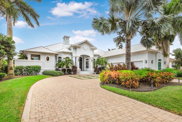 Opulent golf front home with SW-facing lanai and pool