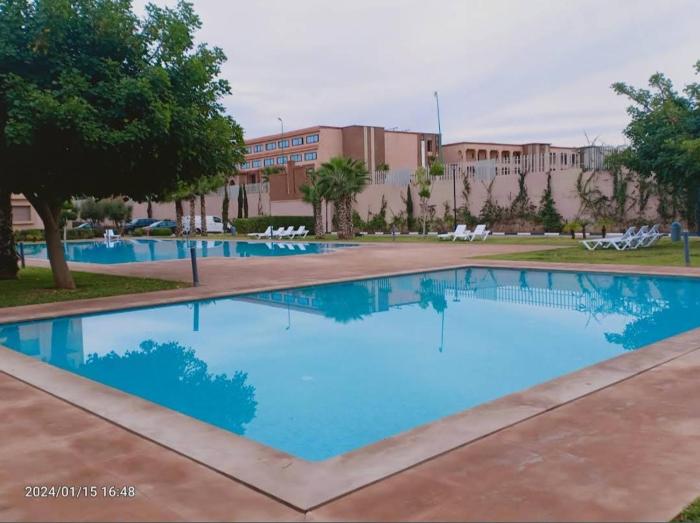 Appartement au coeur de Marrakech avec deux piscines et une charmante vue