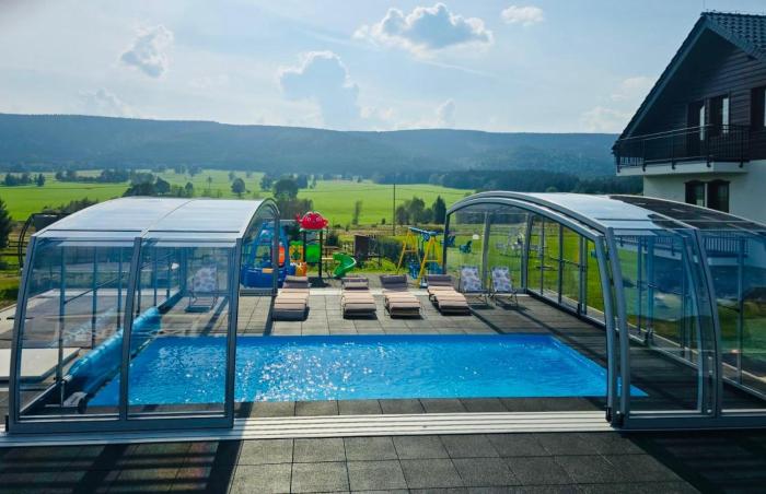 Jagodowy Ski&Spa DeLux apartamenty z widokiem na góry,4km od Zieleniec Ski Arena Podgrzewany basen zewnętrzny latem,bilard,Wi-Fi w cenie Restauracja,balia,sauna na miejscu