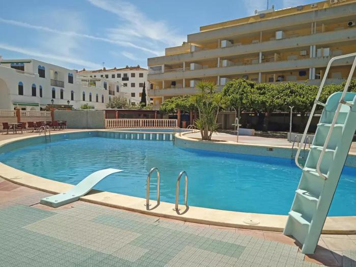 Adosado en la playa con piscina
