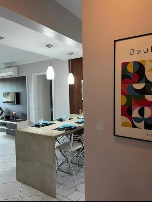 Apto aconchegante e pé na areia