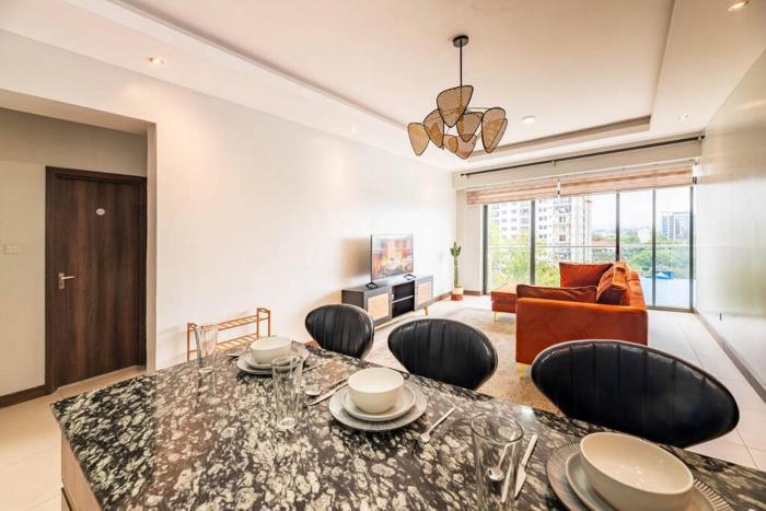 Lush Retreat Near Yaya Center with Pool, Gym & Views