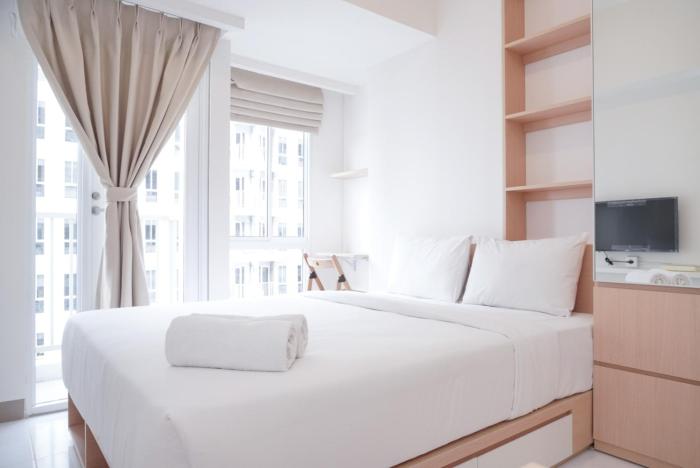 Homey and Simply Studio at Tokyo Riverside PIK 2 Apartment By Travelio