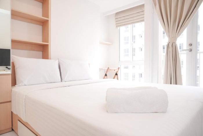 Warm and Simply Studio at Tokyo Riverside PIK 2 Apartment By Travelio