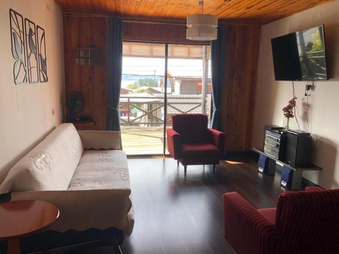 Cabaña a pasos de la costanera con estacionamiento