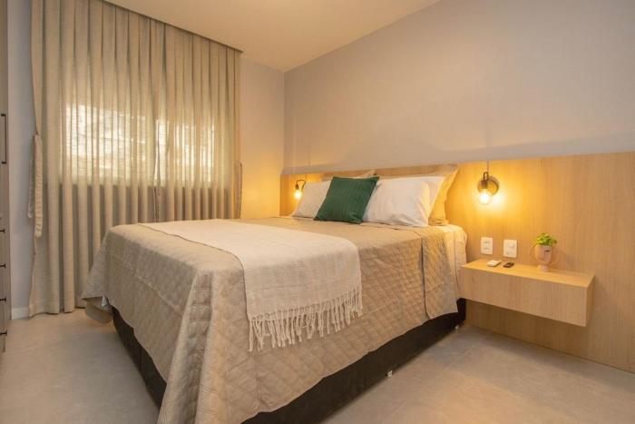 Apartamento próximo a praia com vista lateral do mar