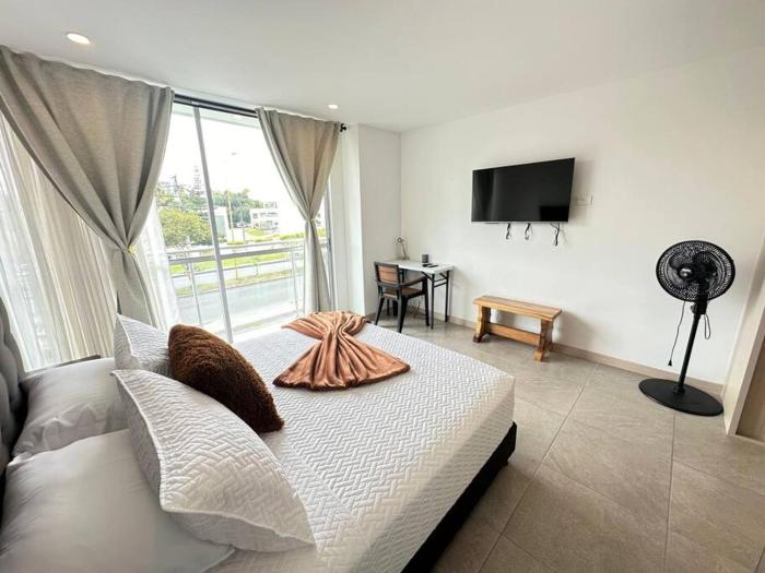 Belmonte218-Apartaestudio en Av centenario con piscina gym bbq