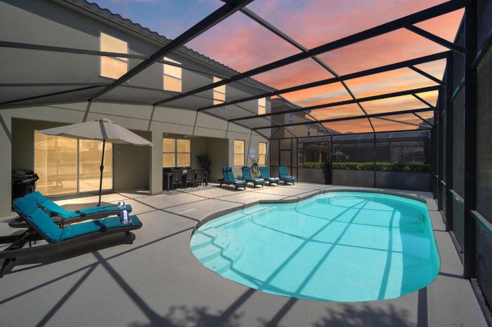 Stunning Lake View from South Facing Extended Pool Deck with Games Room on Gated Solterra Resort