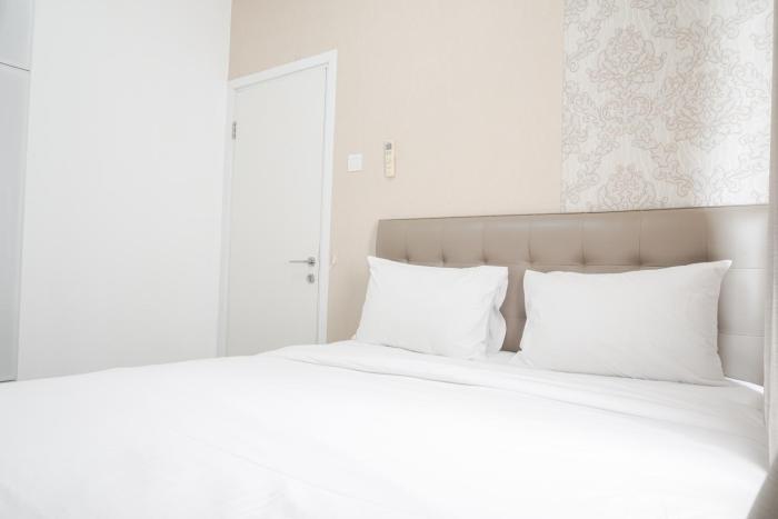 Cozy and Well Designed 2BR at Green Pramuka City Apartment By Travelio