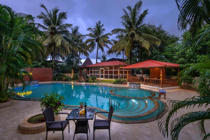 SaffronStays Euphoria Shores - 6BR villa with bar counter, pool & lawns 400m from Kihim Beach in Alibaug