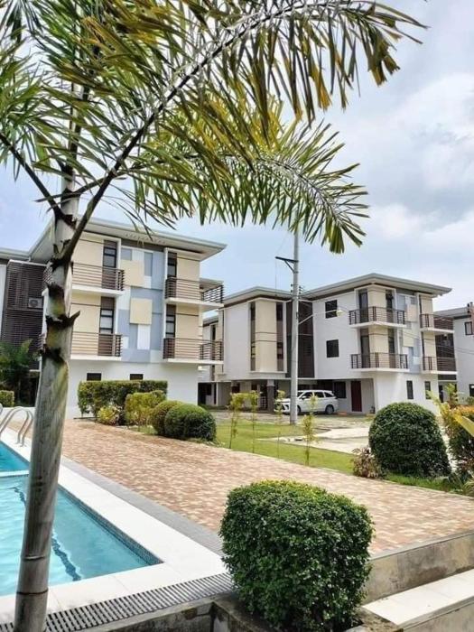 Cozy Condo Almond drive 1BR Talisay SRP w pool