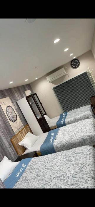 難波梅田地铁直达距离地铁站步行5分钟双床间私人浴室家庭式民宿