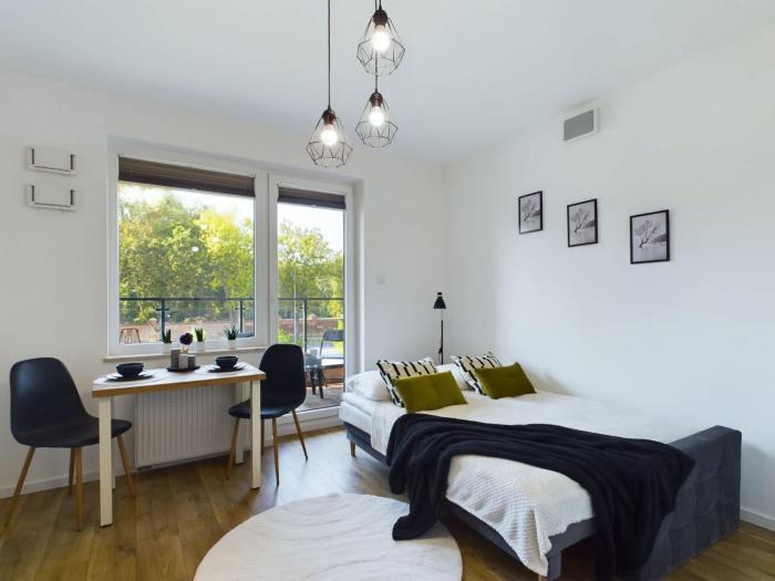 Klimatyczne Studio z Balkonem Warszawa by Noclegi Renters