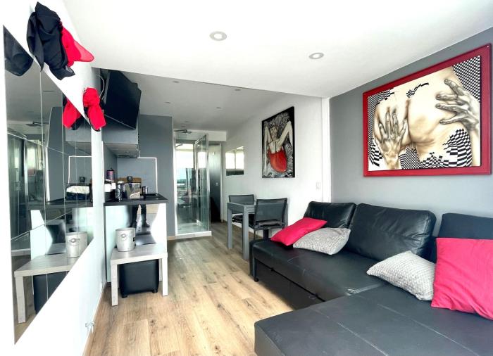 COURSIVES RED-LIGHT 107 Vue Mer