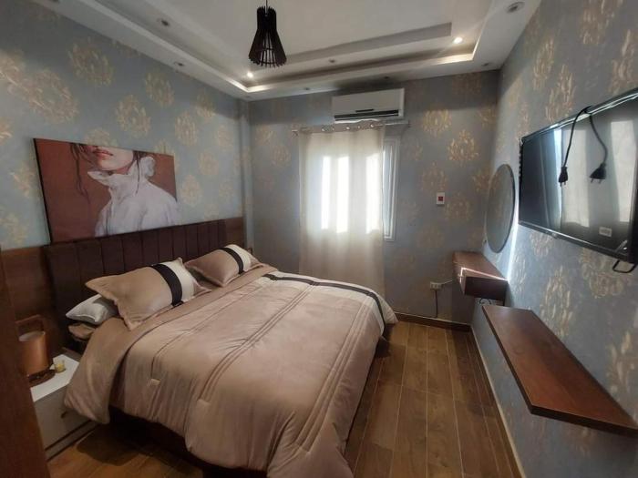 فيلا فندقية خاصة في الشيخ زايد بمدخل خاص حديقة خاصة غرفتين نوم