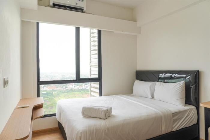 Serene and Modern 2BR Sky House BSD Apartment near AEON By Travelio
