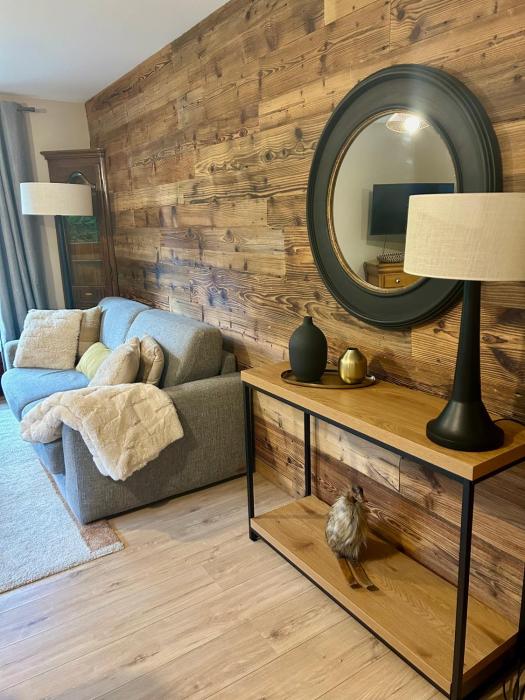 Appartement style chalet avec grande terrasse et parking prive