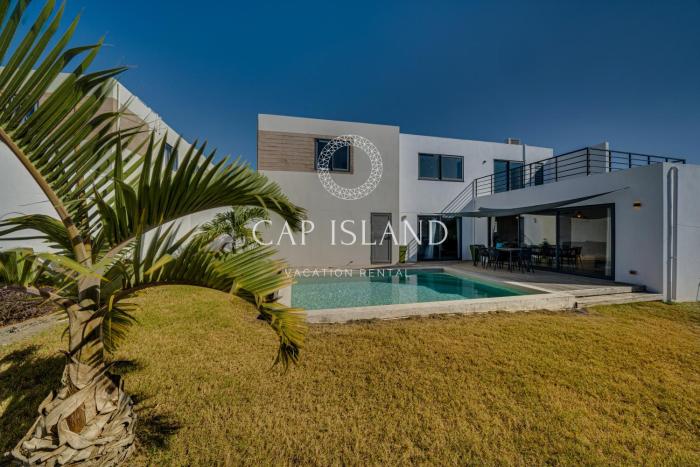 Villa Moderne avec Piscine, Exotisme et Sérénité