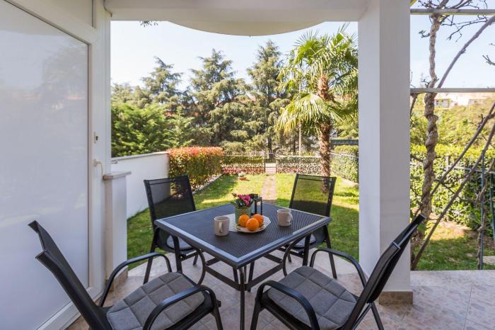 Malerisches Apartment mit mediterranem Garten - nur 450 Meter zum Strand