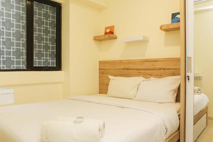 Cozy Living and Tidy 1BR Meikarta Apartment By Travelio