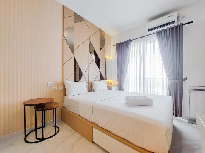 Homey and Cozy Studio Sky House BSD Apartment near AEON By Travelio