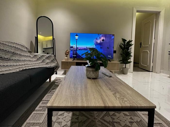 Self-Entry Apartment in Almasif Living Room and Bedroom