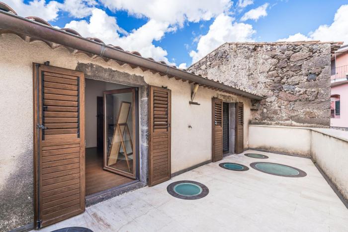 Home Slow between Sea and Olive Trees, Terrace and Tranquility in the Village of Seneghe