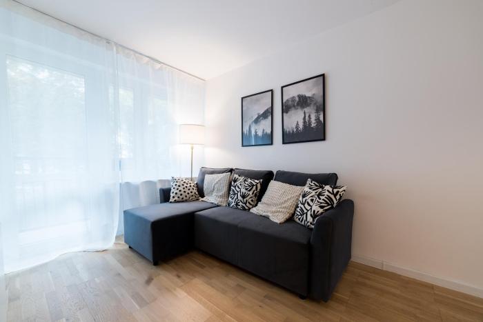 Kosmonautów Comfort Apartment by BookingHost