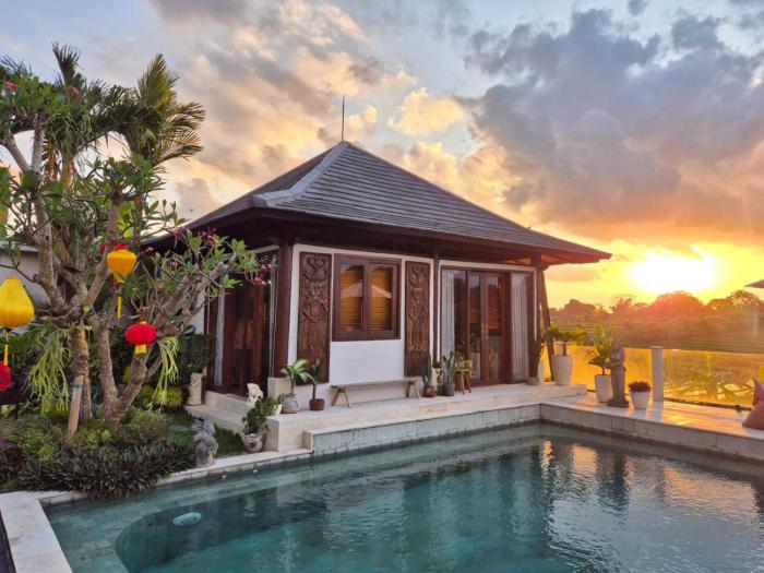Private water room with sunset and rice field view