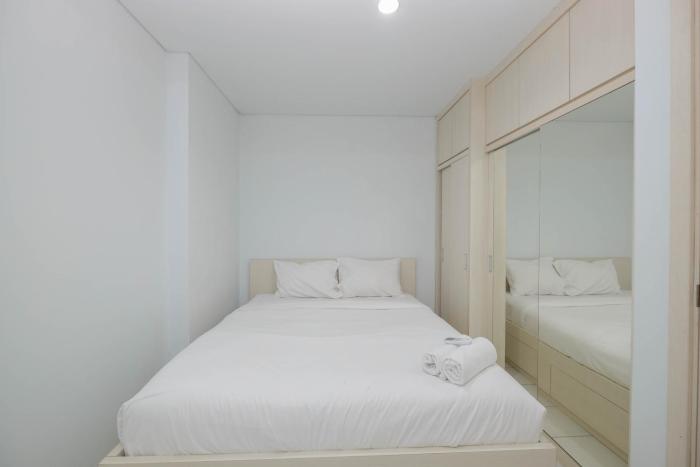 Comfy and Homey 2BR at Patraland Urbano Apartment By Travelio