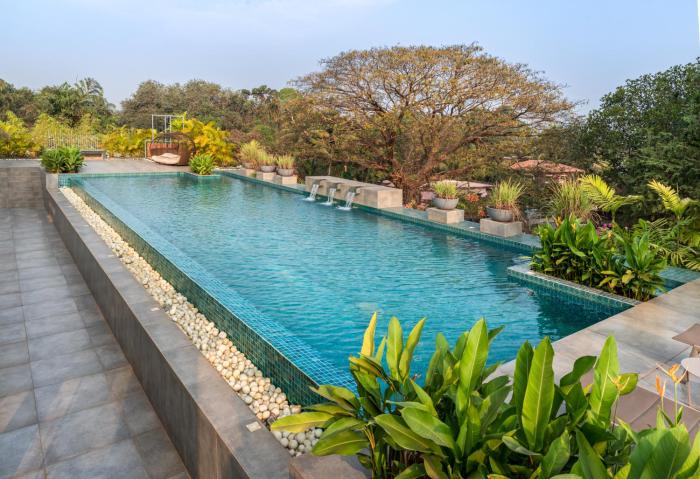 El Arbol with Rooftop Pool, Kitchen, Wifi, Security,10 Mins to Candolim Beach & 5 mins to Casino