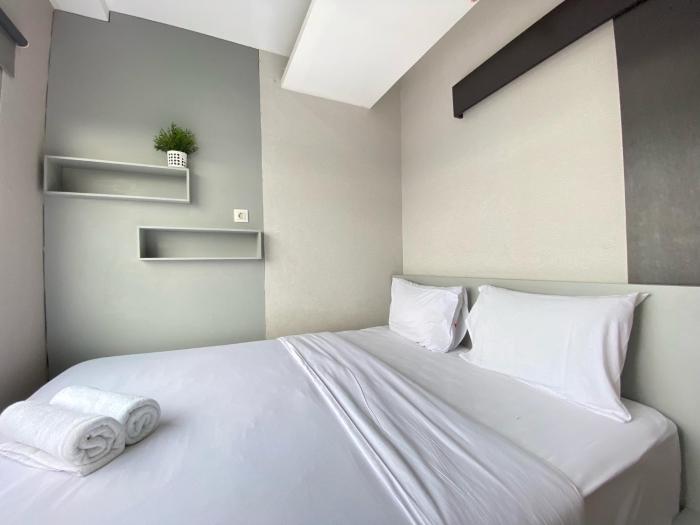 Cozy Furnished 2BR Apartment at Grand Asia Afrika By Travelio