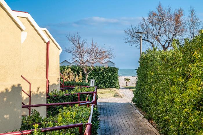 Senigallia, bilocale fronte mare con giardino - SE040