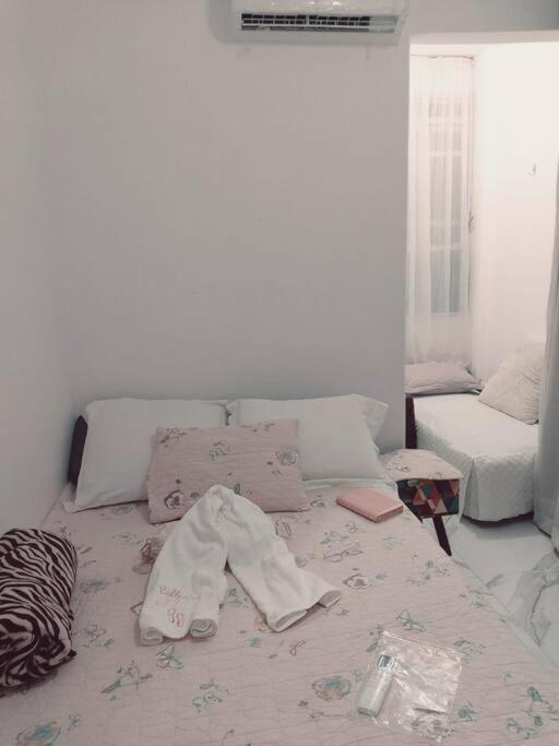 Quarto c ar-condicionado em apê em Copacabana