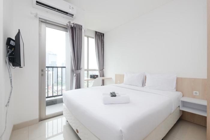 Comfort and Warm Studio at Ciputra World 2 Apartment By Travelio